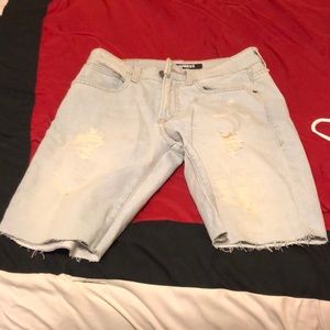 Ripped light denim shorts